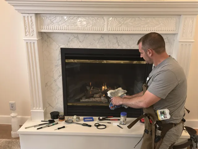 Tamiami Chimney Sweep performing fireplace maintenance in Tamiami, FL