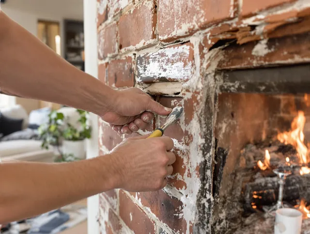 Routine fireplace repair by Tamiami Chimney Sweep in Tamiami, FL